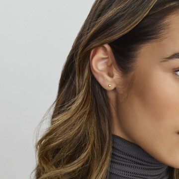 Gouden oorknopjes Bewerkt bolletjes 4mm.