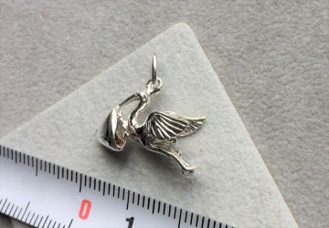 Zilveren ooievaar met baby luxe geboorte zwanger