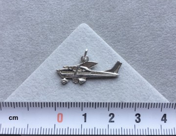 Zilveren vliegtuig Cessna hanger