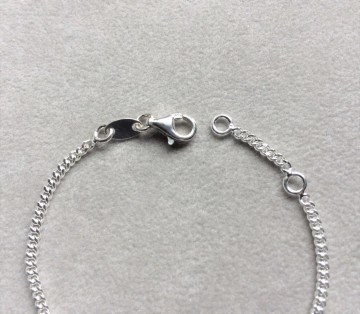 Zilveren baby graveerarmbandje 13-15 cm Hartje (korte namen)