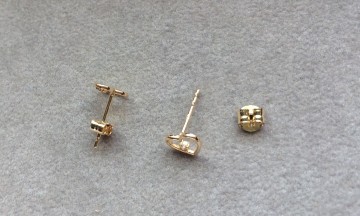 Gouden oorknoppen hartjes + zirkonia 6,5 mm