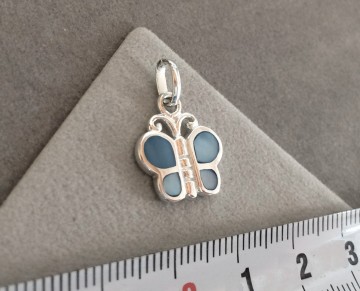 Zilveren vlinder hanger blauw parelmoer