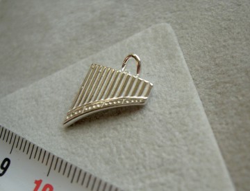 Zilveren panfluit hanger