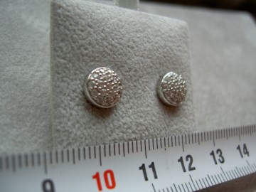 Zilveren oorbellen rond zirkonia's