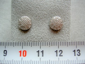 Zilveren oorbellen rond zirkonia's