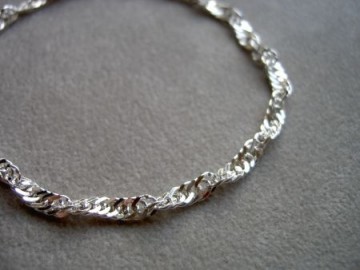 Zilveren dames armbandje - Gedraaid