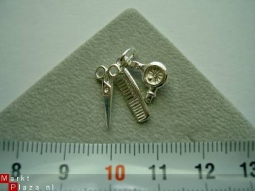 Zilveren kapper hangertje