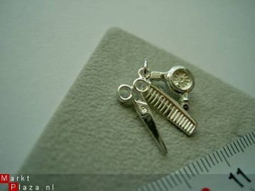 Zilveren kapper hangertje
