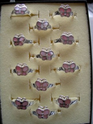 Zilveren vlinder ring met roze parelmoer